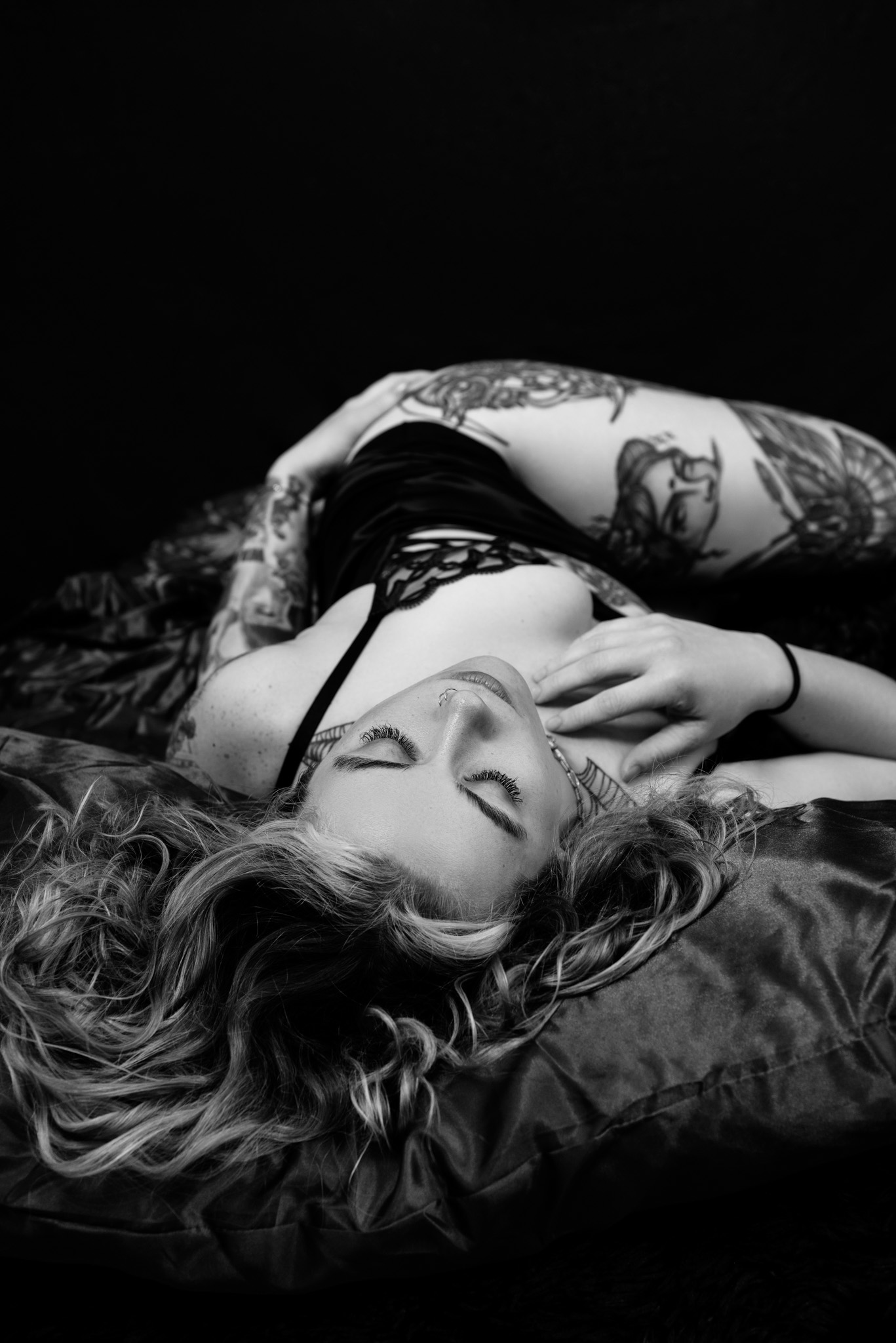 Intimate image of a woman lying on a bed